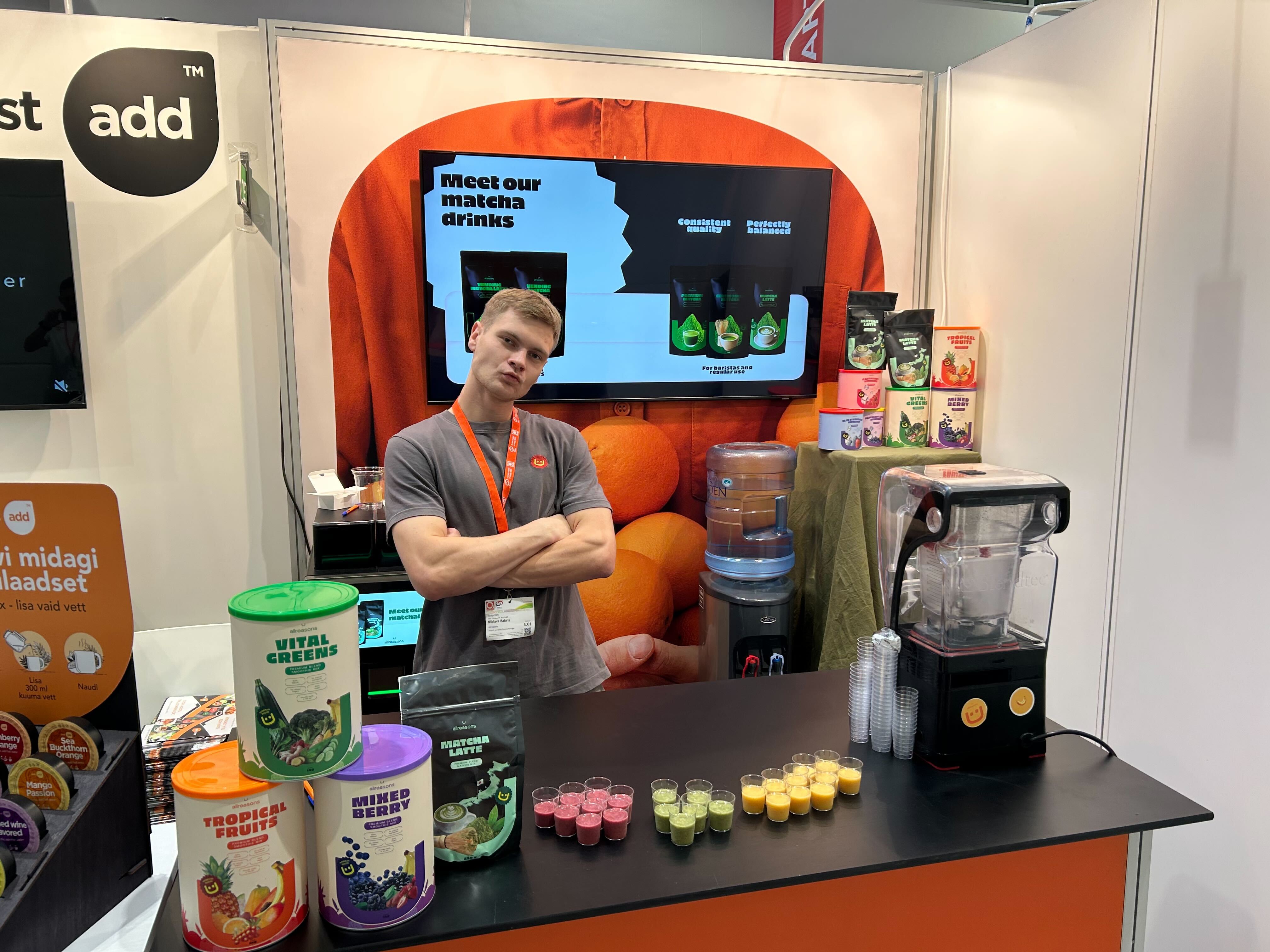 Allreasons team presenting products at trade show booth