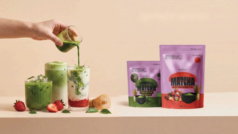 Barista pouring matcha over iced lattes next to Allreasons matcha pouches